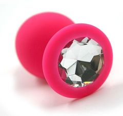 Розовая силиконовая анальная пробка с прозрачным кристаллом - 8,3 см.